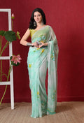 Mint green chiffon saree with spray brush handwork, front view